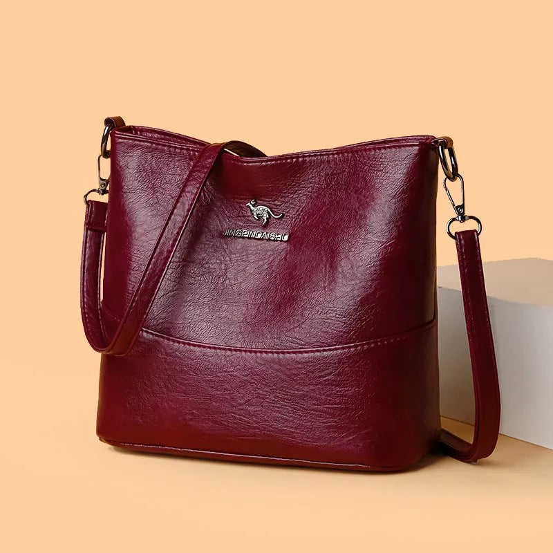 Women's soft leather large capacity shoulder bag in bucket shape with minimalist luxury styling