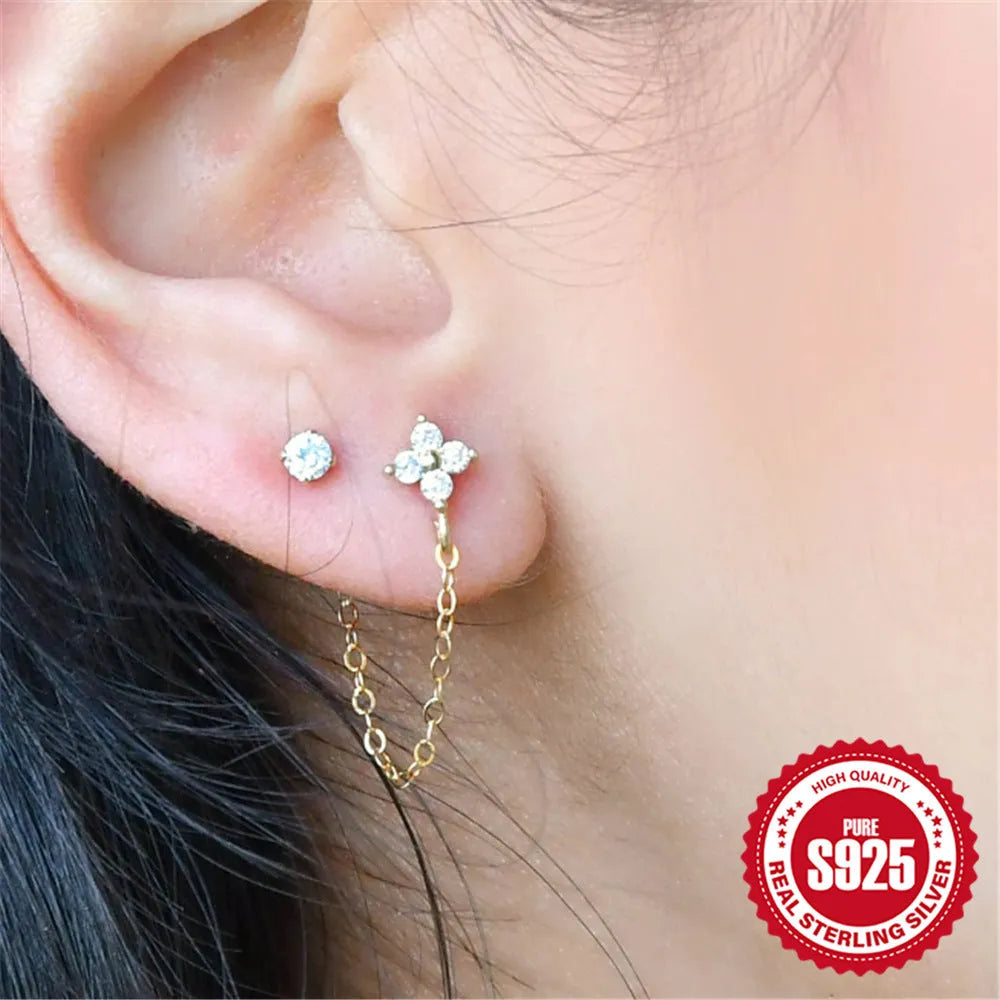 S925 sterling silver ear clip studs with flower, tassel and chain design in golden electroplated finish