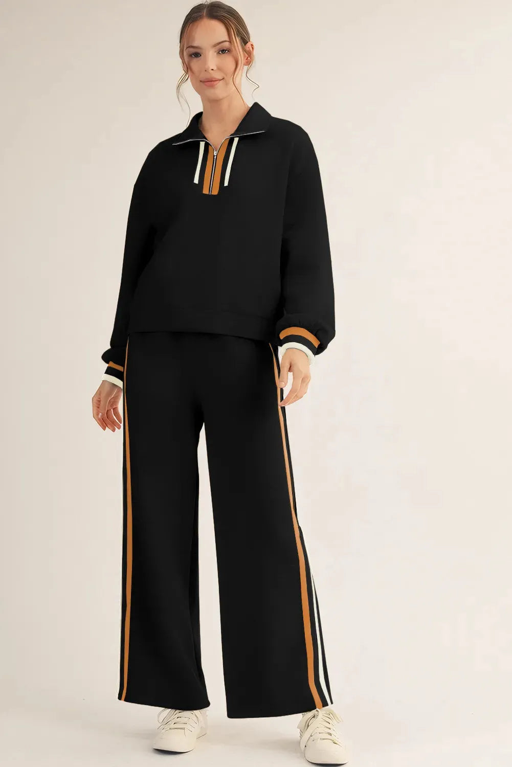 Black striped patchwork quarter zip pullover and loose trousers loungewear set on model