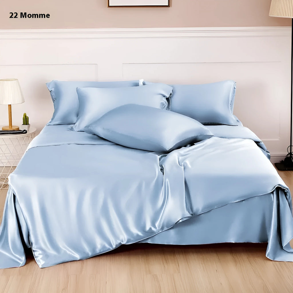 Double-sided silk duvet cover in a solid colour, shown in bright brown on a bed.