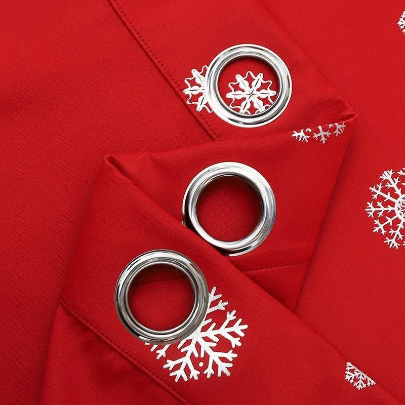 Red snowflake pattern shade cloth curtain with iron hoop hanging tabs.