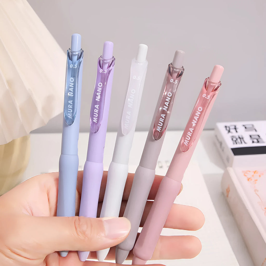 Macaron colour press gel pen with 0.5mm tip shown in smoked brown, white, and pink ink options