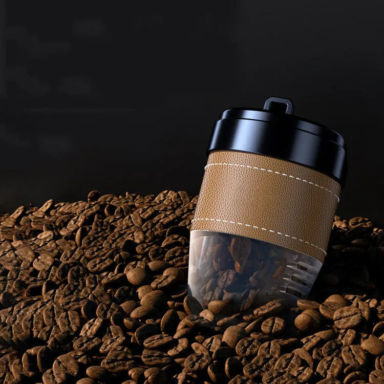 Solid plastic car air freshener shaped like a coffee cup in various colours.