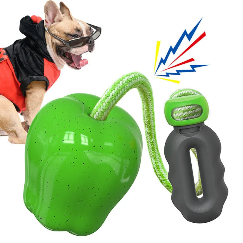 Green plastic dog food dropping ball with textured molar cleaning surfaces