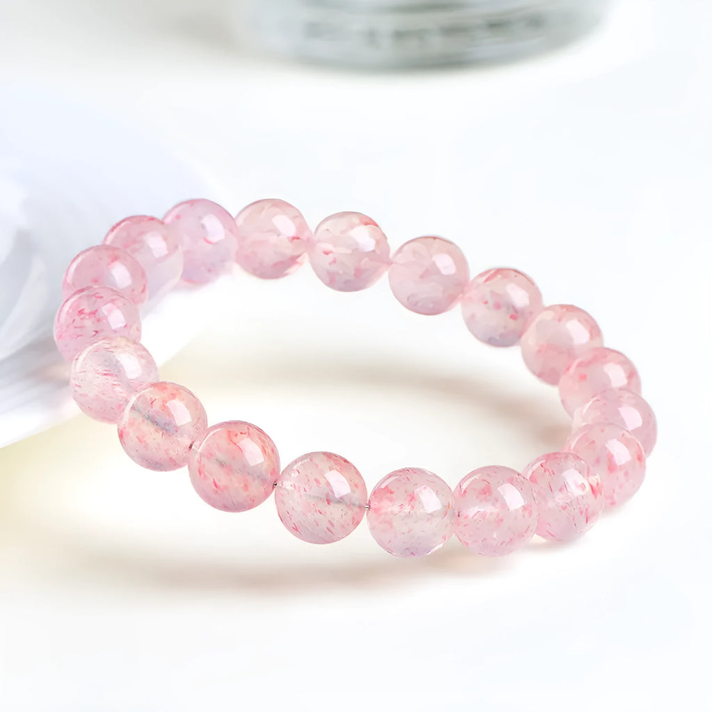 Strawberry quartz crystal bracelet with geometric beads in natural white water colour