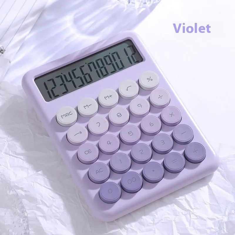 Gradient colour desktop calculator in four colour options on desk