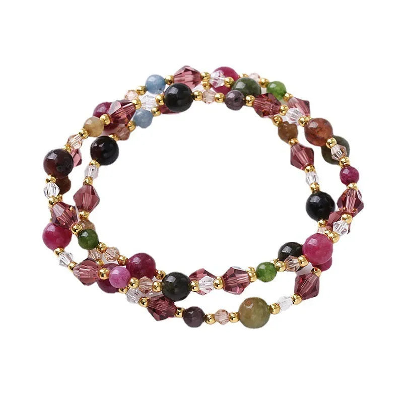 Handmade three-ring adjustable bracelet with colourful crystal stones on adjustable cord