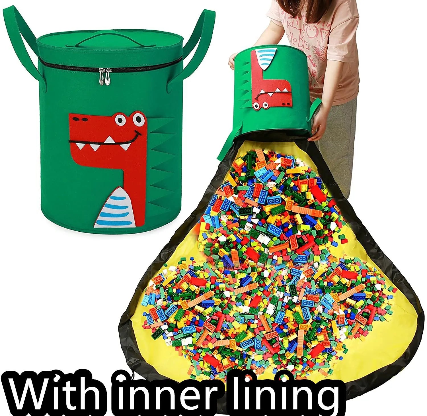 Green felt cube storage bag with pull rope open as a floor play mat for toys.