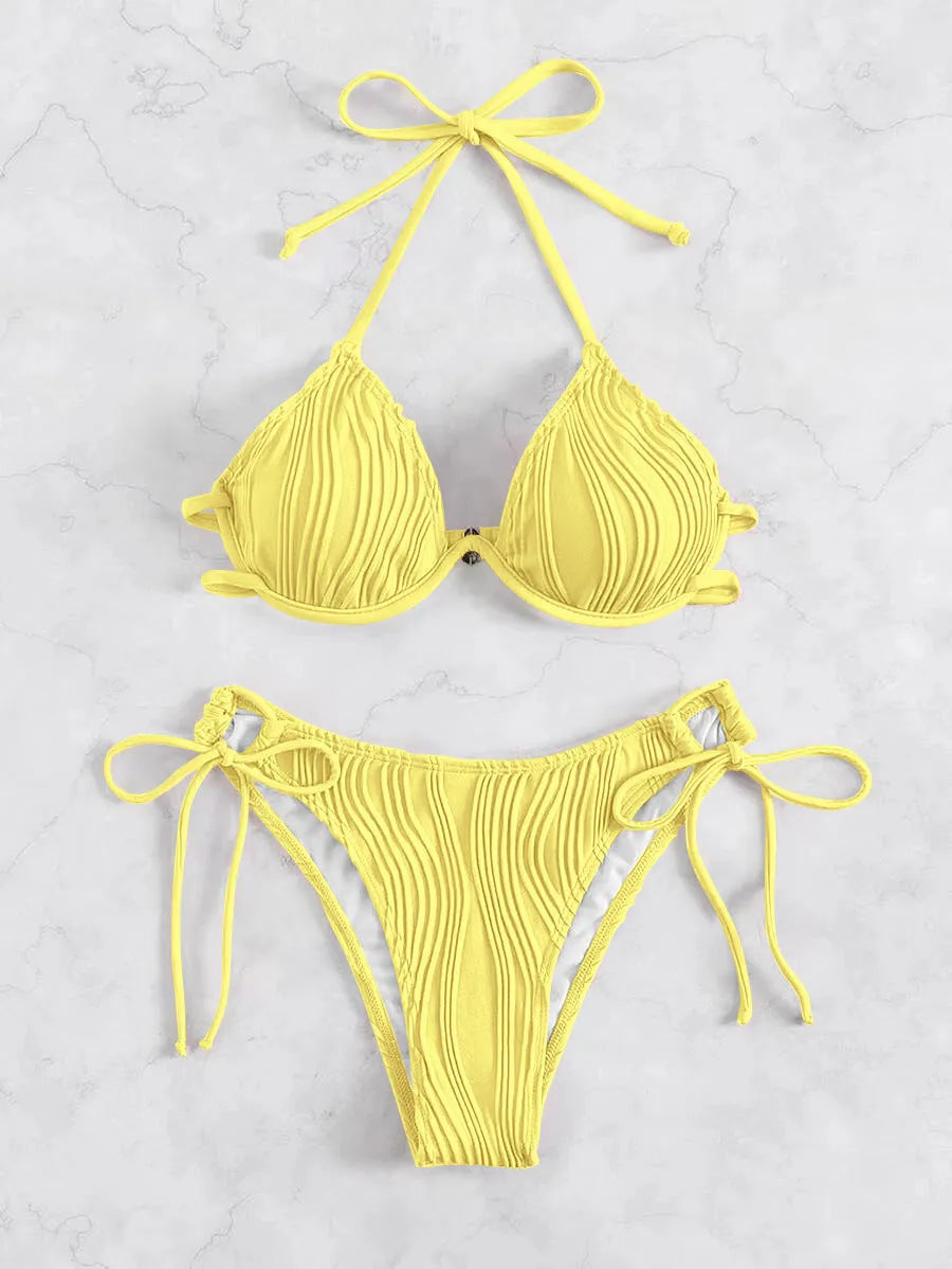 Women's black bikini set with halter neck top featuring a steel bracket and high-waisted bottoms.