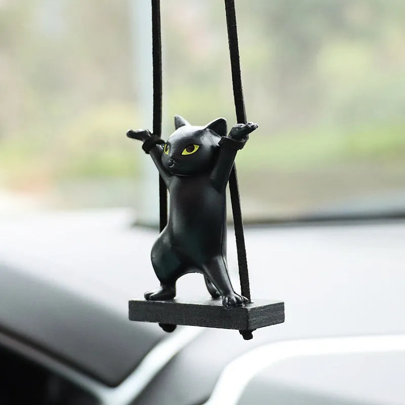 Cartoon-style resin cat pendant on a rope for car interior decoration