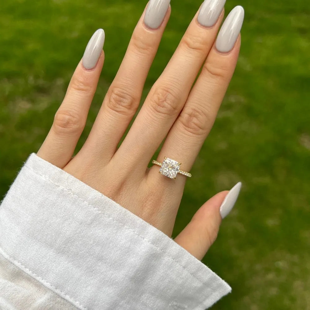 Sterling silver geometric cube sugar ring with ice flower cut cubic zirconia on silver background