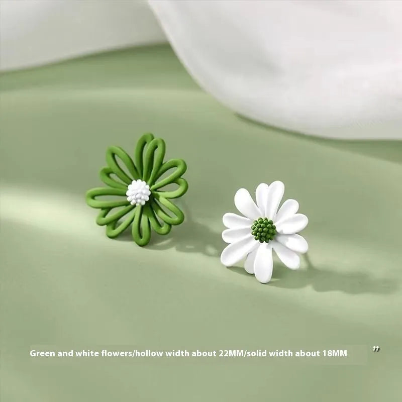 Alloy flower-shaped stud earrings in two-tone blue orange, white green, and yellow white colour combinations.