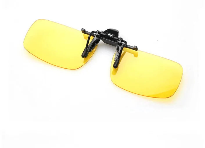 A clip-on sunglasses accessory with PC lenses shown in dark green, grey, and night vision tints, designed to fit over prescription glasses.