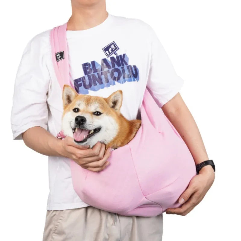 Large breathable mesh cat carrier backpack shown in a folded position and worn on a person's back.
