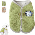 Green coral fleece dog vest with a metal leash ring on the back for a small dog.