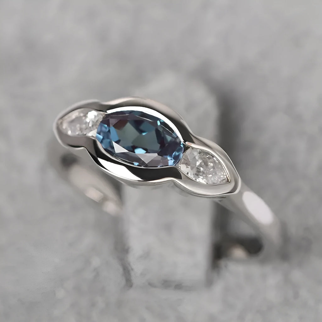 Geometric ellipse women's ring with inlaid zircon stone in white gold plating