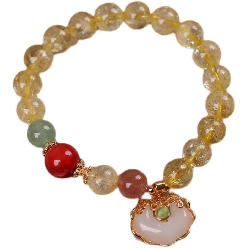 Women's alloy bracelet with a yellow citrine jade ruyi pendant charm.