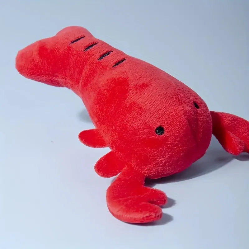 Red lobster-shaped squeaky plush dog toy for small and medium breeds.