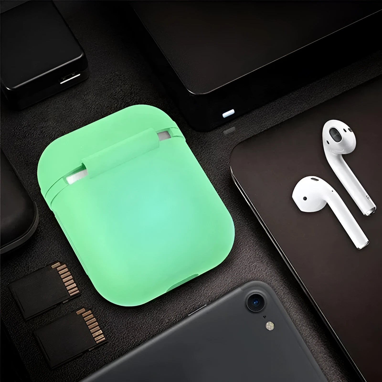 Luminous silicone flip case for Apple AirPods wireless earphones showing open and closed positions.