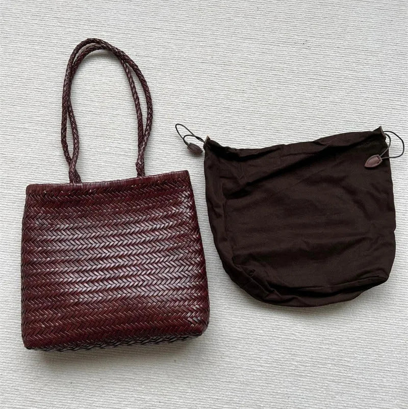 Handmade brown woven leather tote bag with three-dimensional pocket and shoulder strap