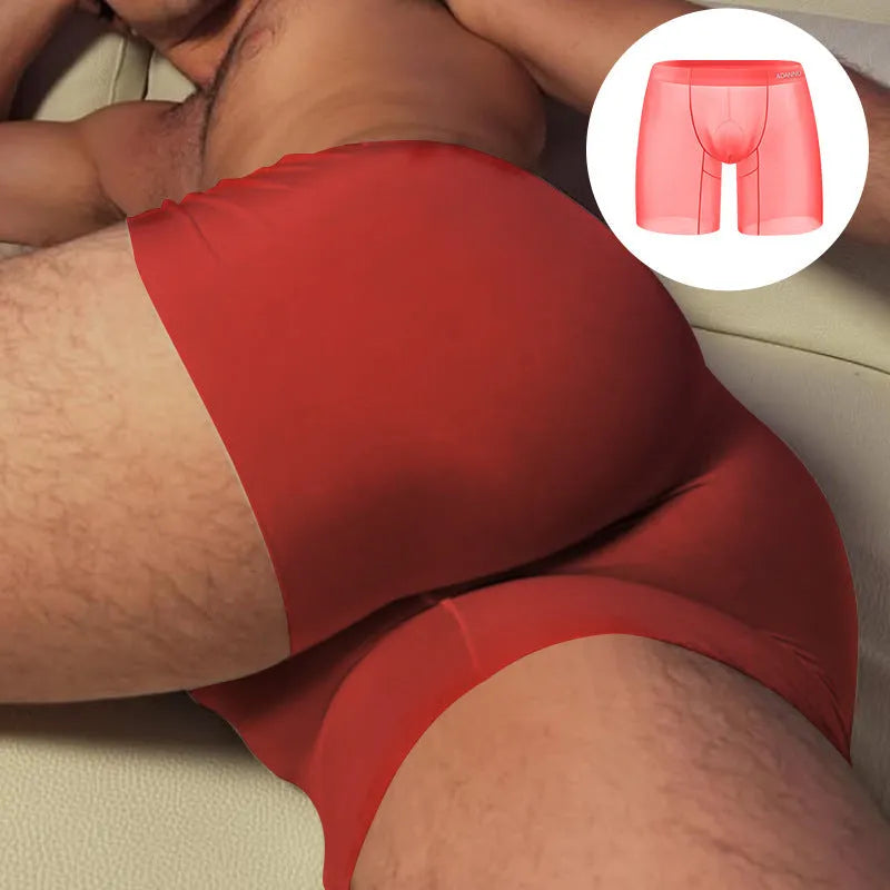Men's seamless low waist nylon boxer shorts in orange colour with hip-lifting design