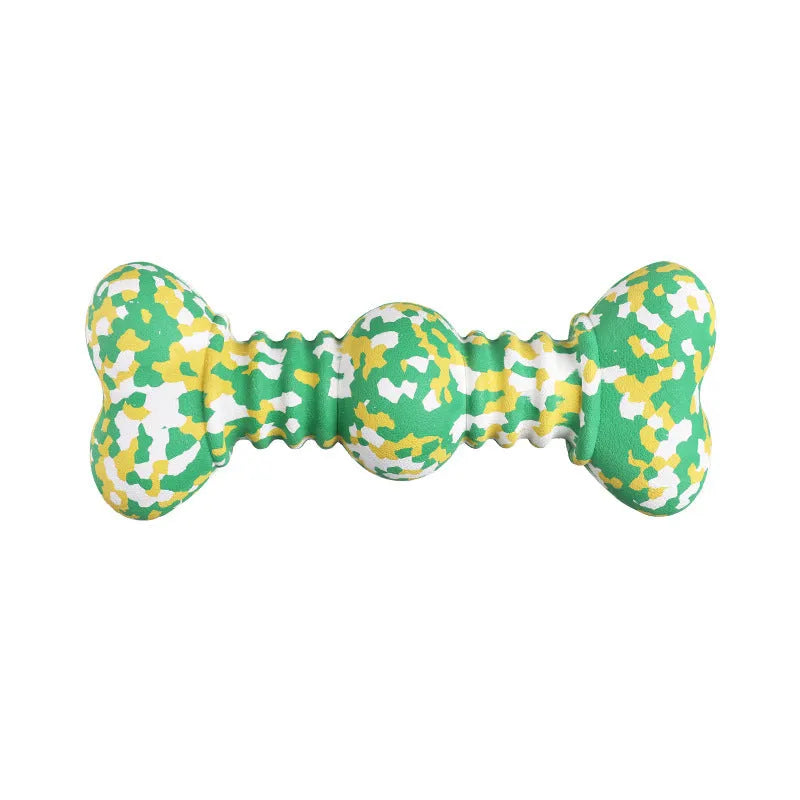 Green, white, and yellow camouflaged natural rubber bone chew toy for large dogs on a plain background.