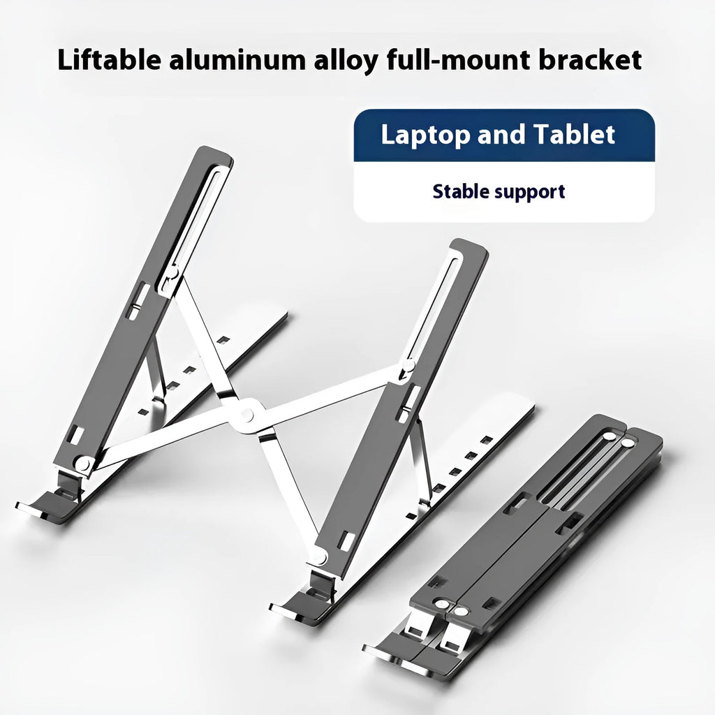 Silver aluminium alloy folding laptop stand with black silicone pads on a wooden desk.