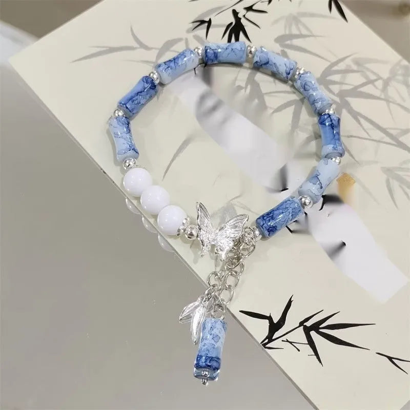 Chinese style bamboo leaf glass bracelet for women with a bamboo joint design.