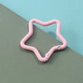 Zinc alloy five-pointed star keychain in light pink, one of ten available macaron colours.