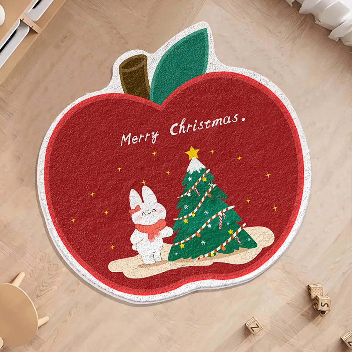 Round alien-shaped Christmas carpet in imitation cashmere, showing one of six festive colour designs.
