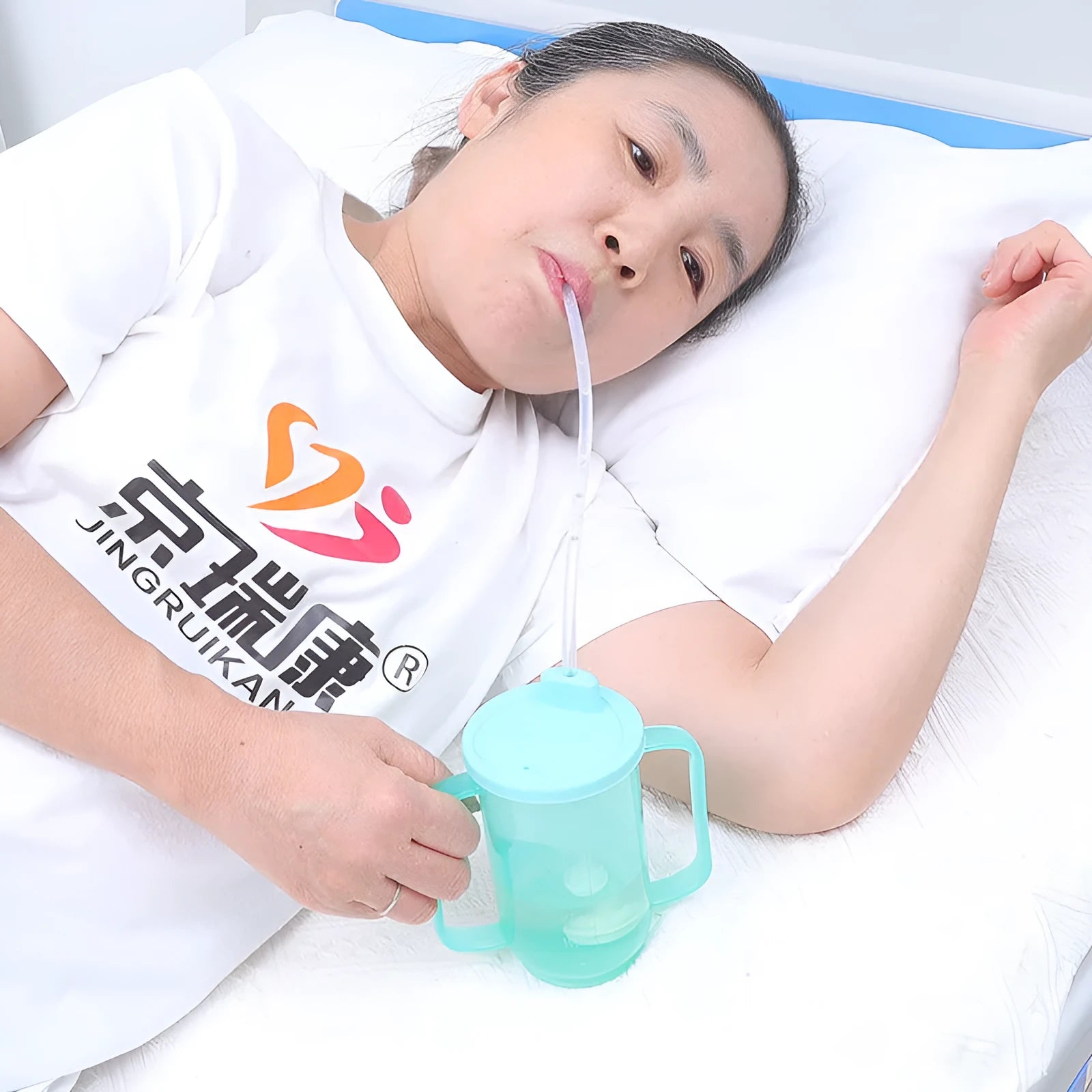 Oblique mouth choke proof cup with optional wrist splint for elderly bed drinking safety