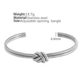 Adjustable C-shaped open double-layer women's bracelet with a knotted clasp in gold or silver finish.