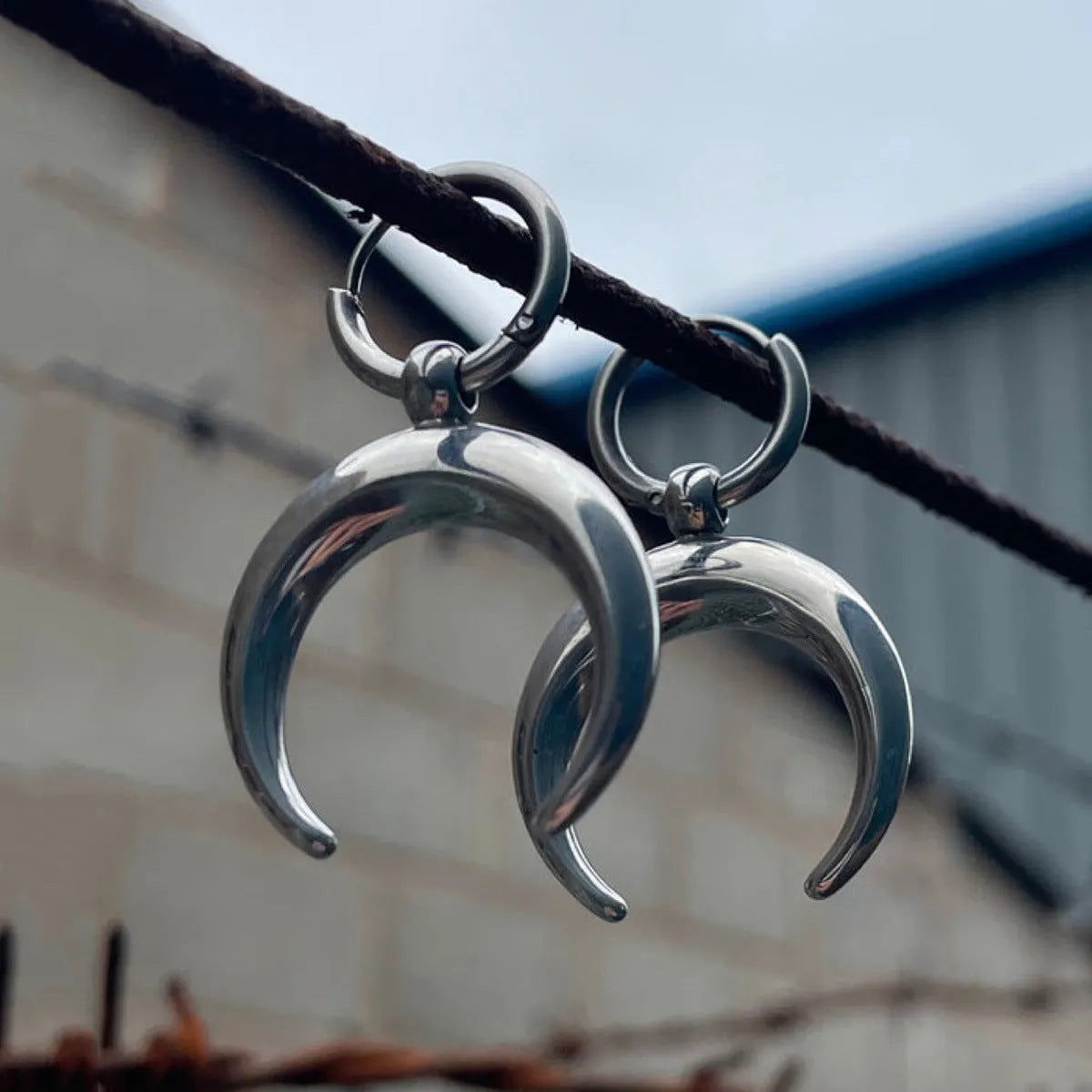 Silver geometric hoop earrings with vintage moon design and punk style