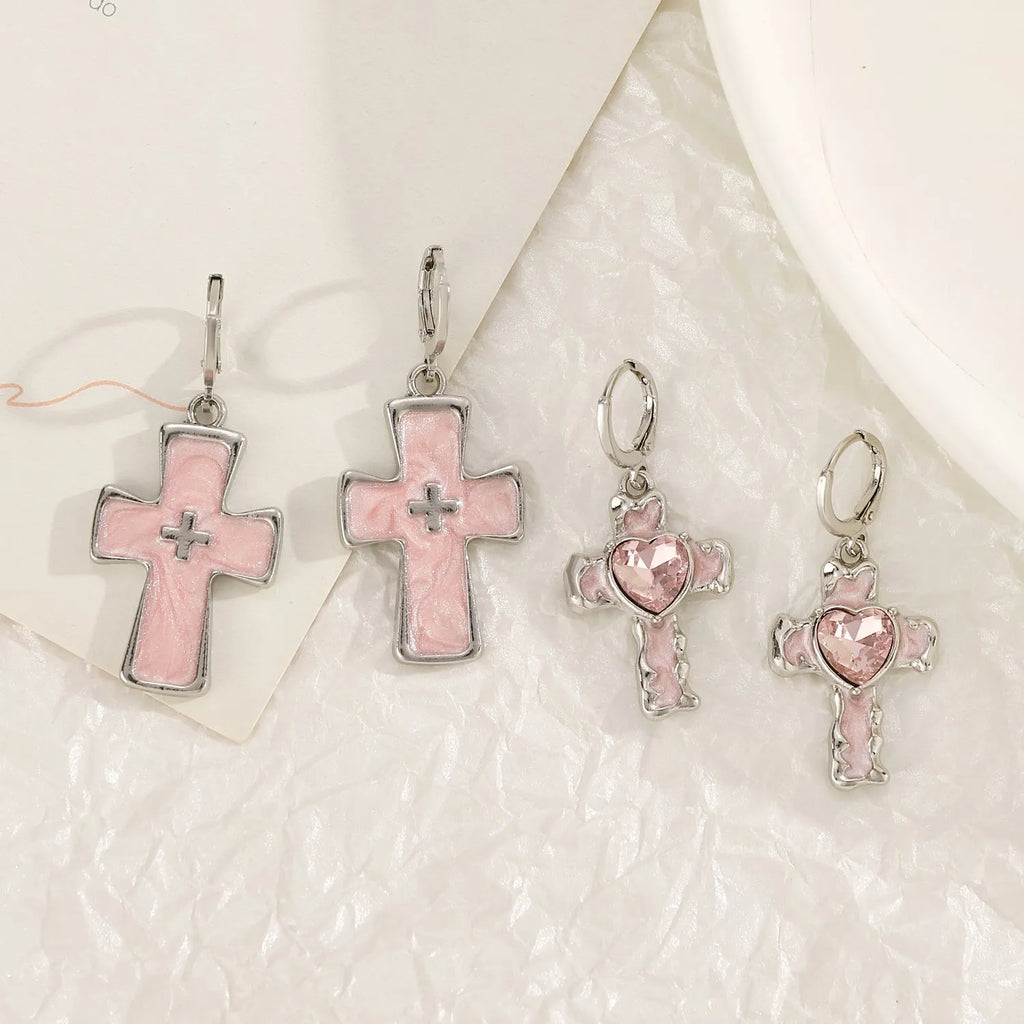 Women's alloy cross crystal earrings in five colour options with cross, heart, and character design elements