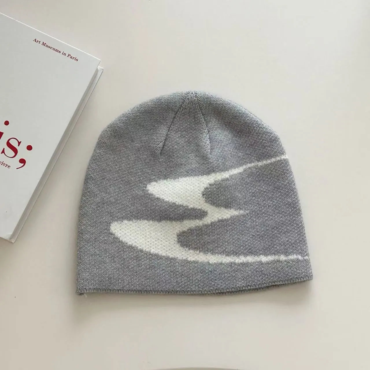 Acrylic knitted beanie hat in black, grey or white colours with 56-58cm head circumference