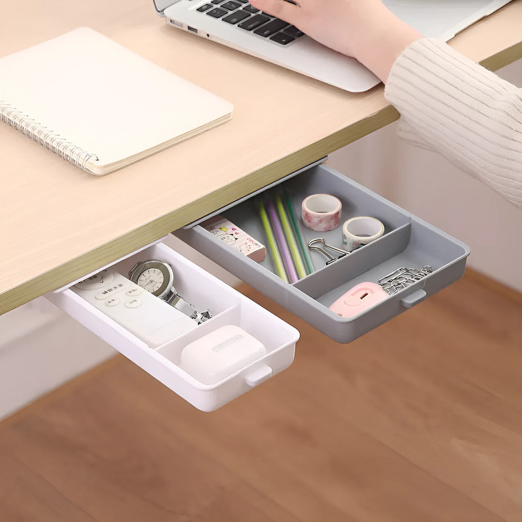 White adhesive under desk storage drawer with lid open, showing interior grid divider.