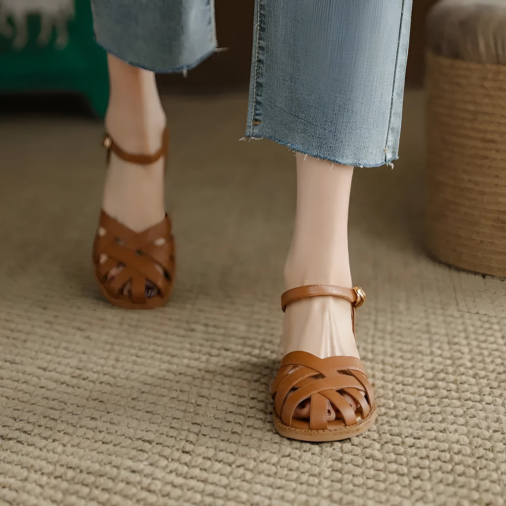 Women's flat closed toe sandals with word strap and buckle in beige colour