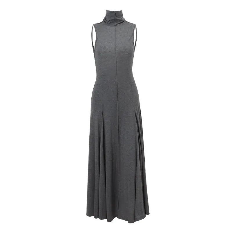 Grey slim-fit women's dress with half turtleneck front and backless design
