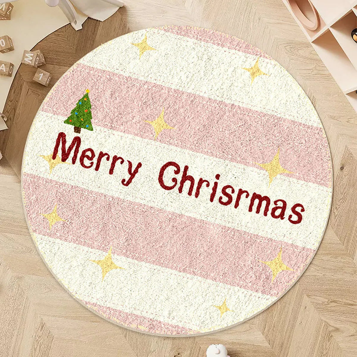 Round alien-shaped Christmas carpet in imitation cashmere, showing one of six festive colour designs.