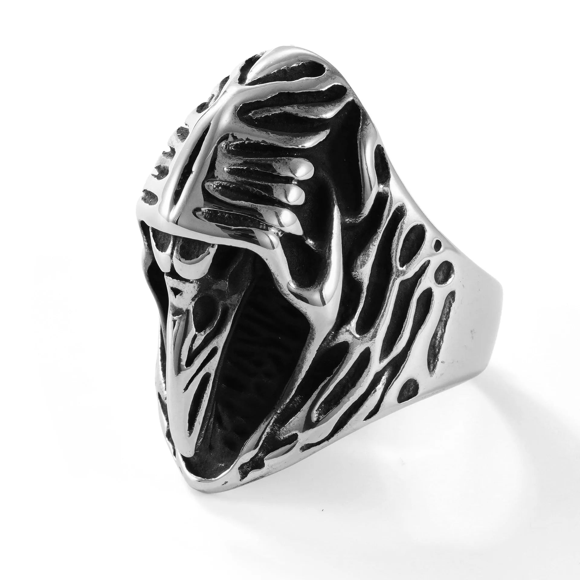 Geometric titanium steel crow ring in punk style on a grey background.