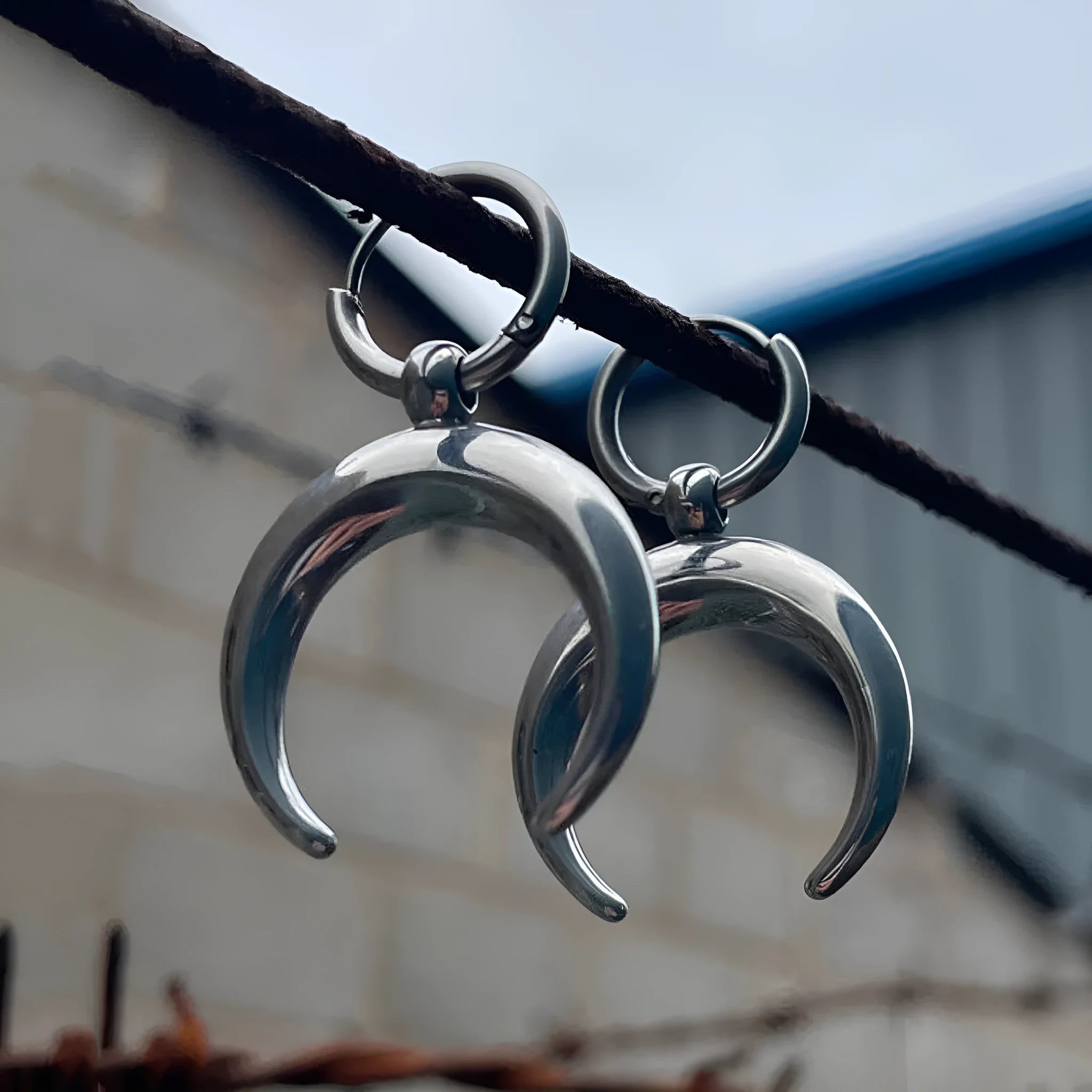 Silver geometric hoop earrings with vintage moon design and punk style