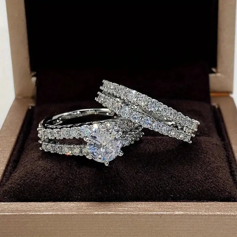A 2 in 1 set of fully-jewelled geometric rings for women, shown in rose gold, silver, and gold colour options.