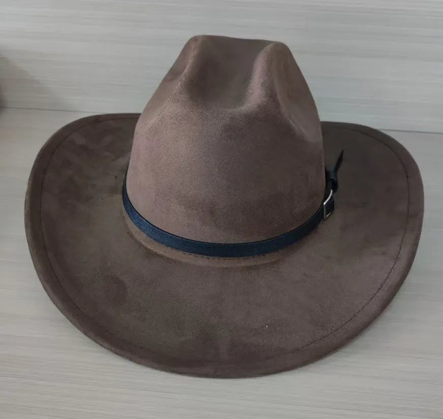 Brown leather velvet Western cowboy hat with a curved edge brim and conical crown.