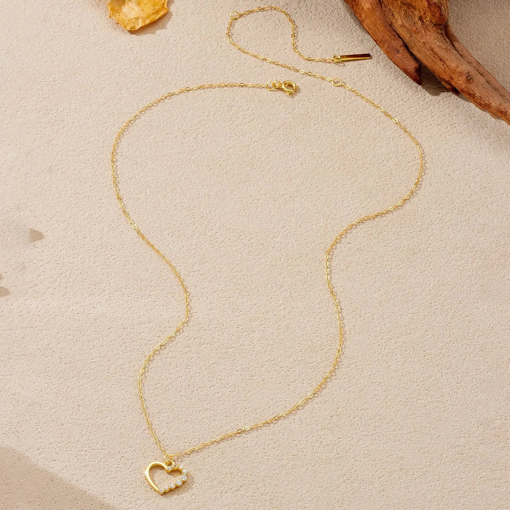 S925 sterling silver hollow heart and circle pendant necklace on a regular chain.