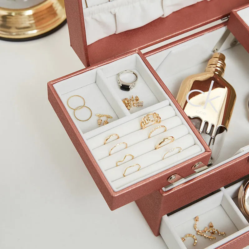 Hard-shell PU leather jewelry storage box in beige, black, pink, or rose gold.