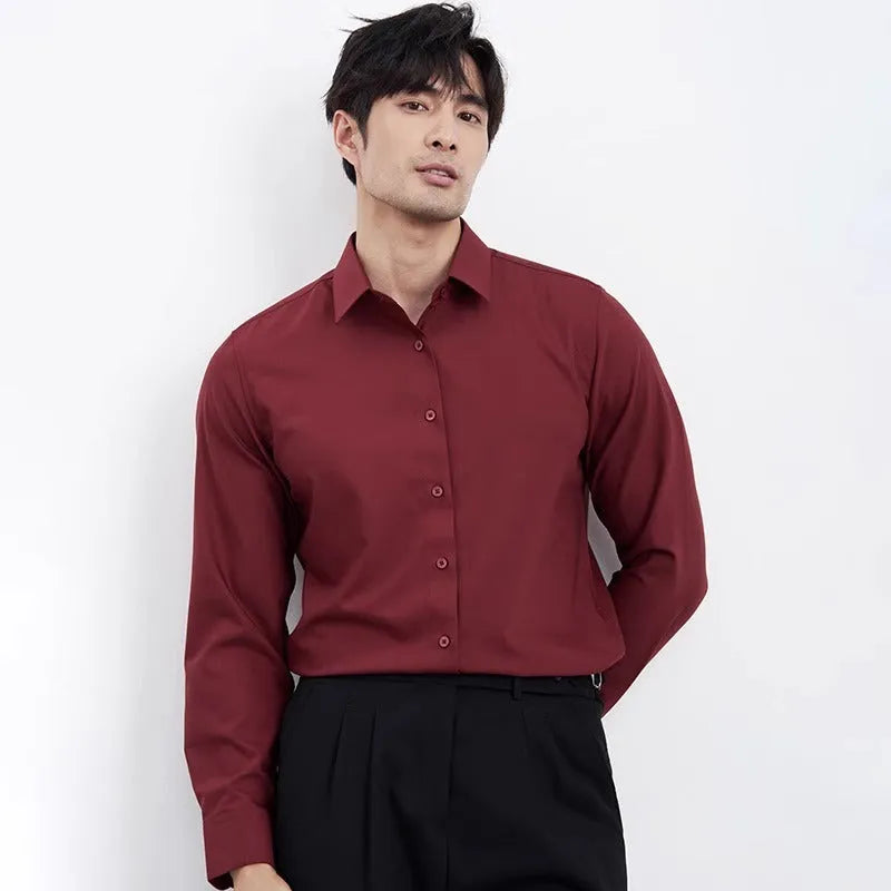 Wine red men's slim fit long sleeve casual shirt on a hanger.