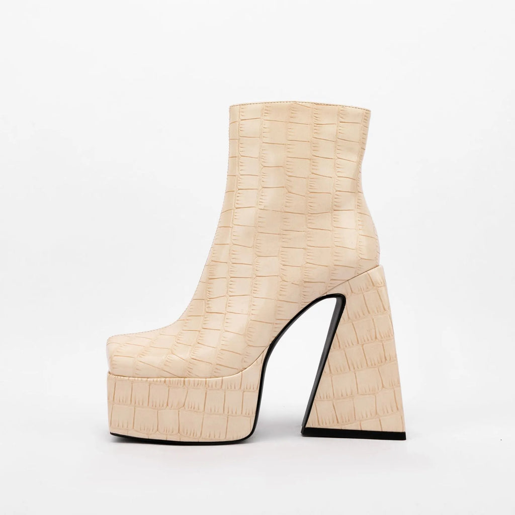 Women's artificial PU ankle boots with a high heel, shown in beige colour.