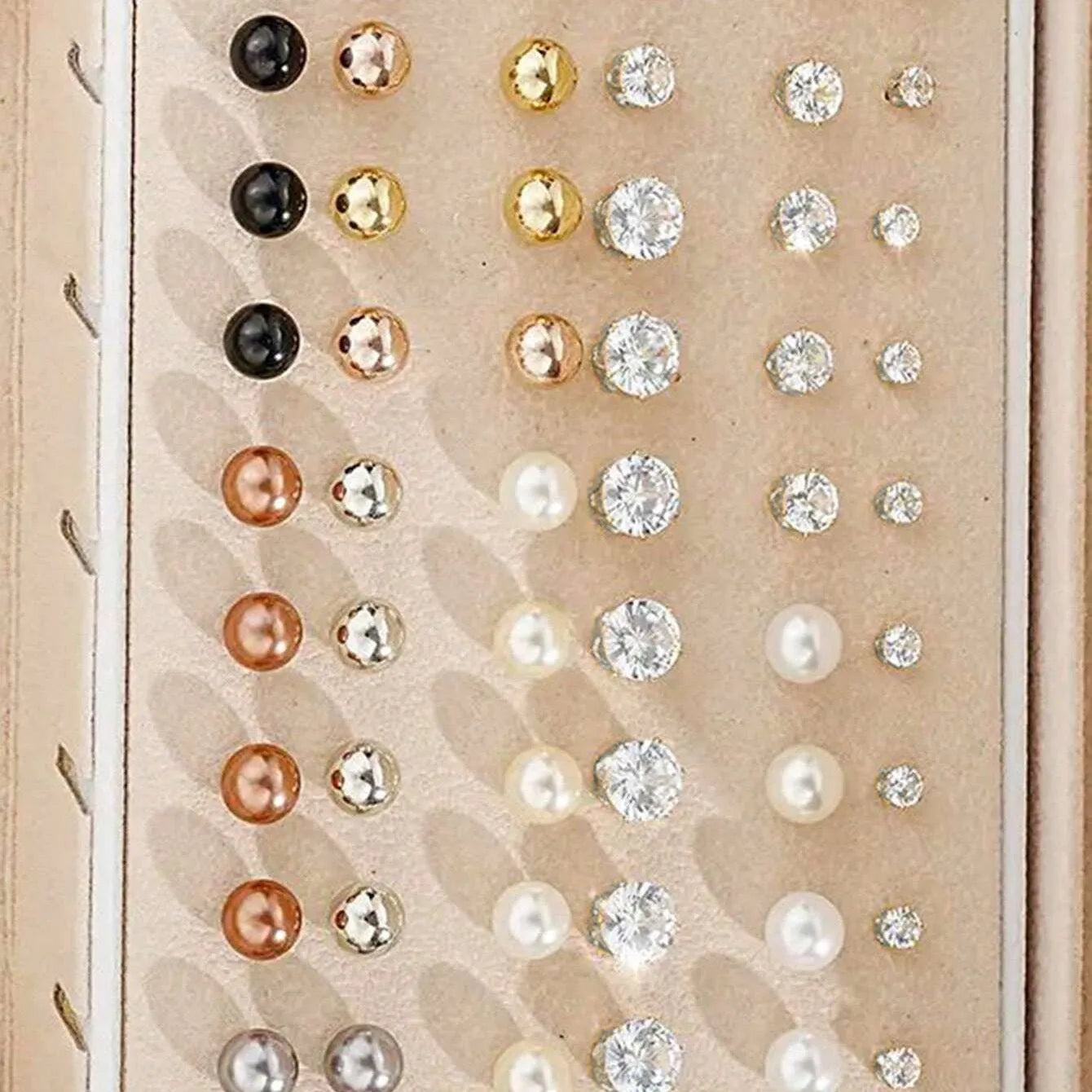 108 geometric pearl earrings assortment showing gold and yellow electroplated colours on alloy construction