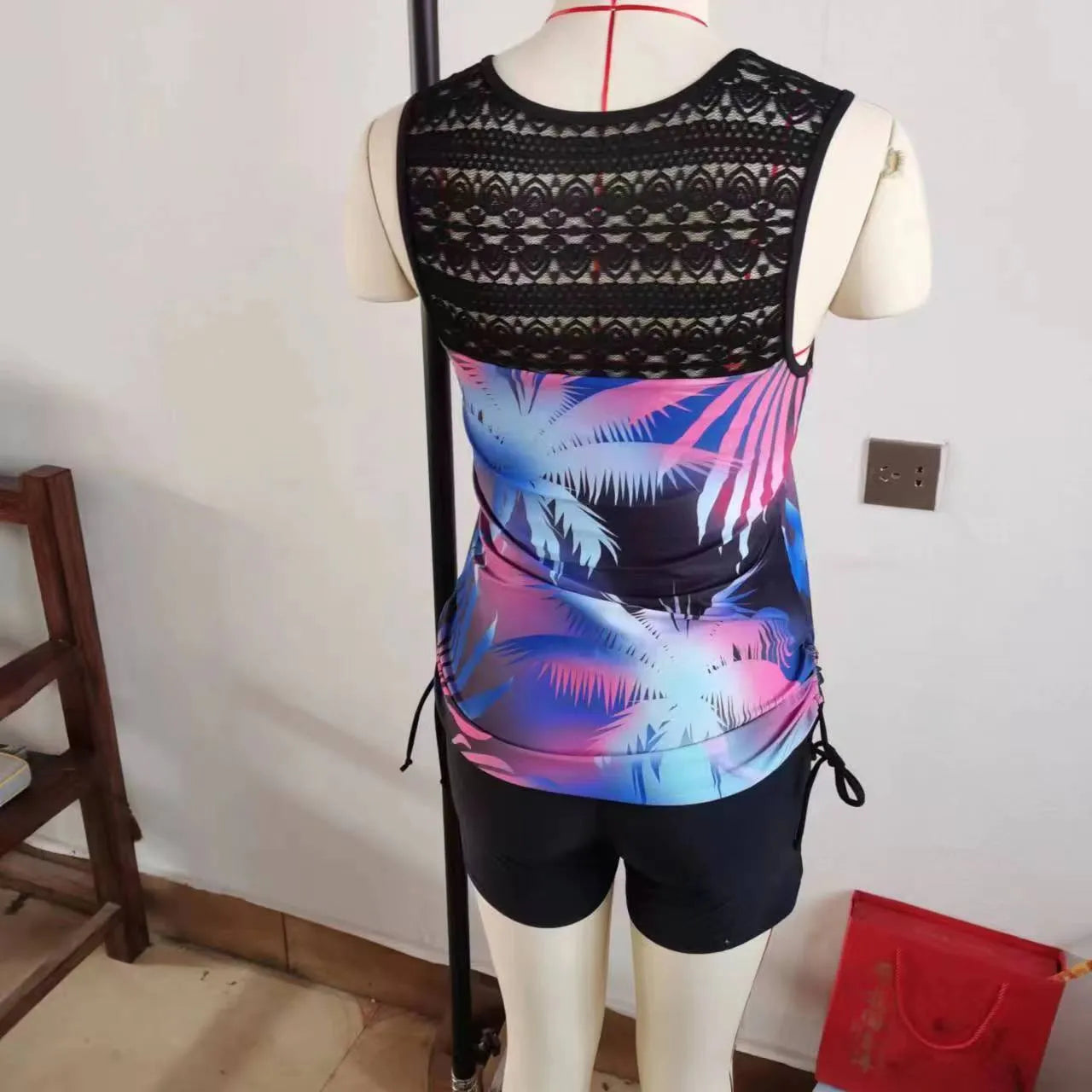 Women's floral printed lace two-piece swimsuit in blue colour with bikini style
