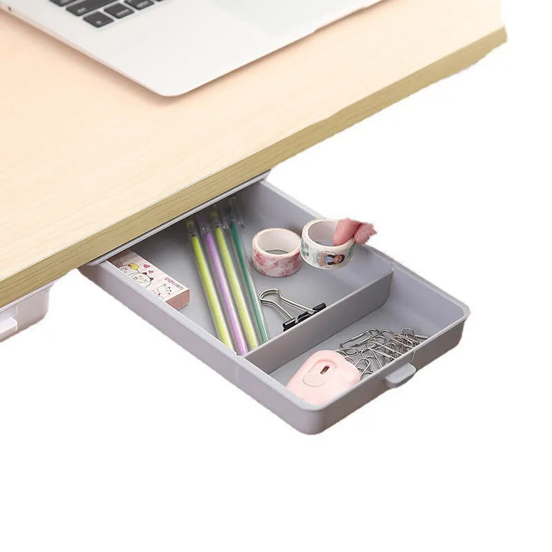 White adhesive under desk storage drawer with lid open, showing interior grid divider.